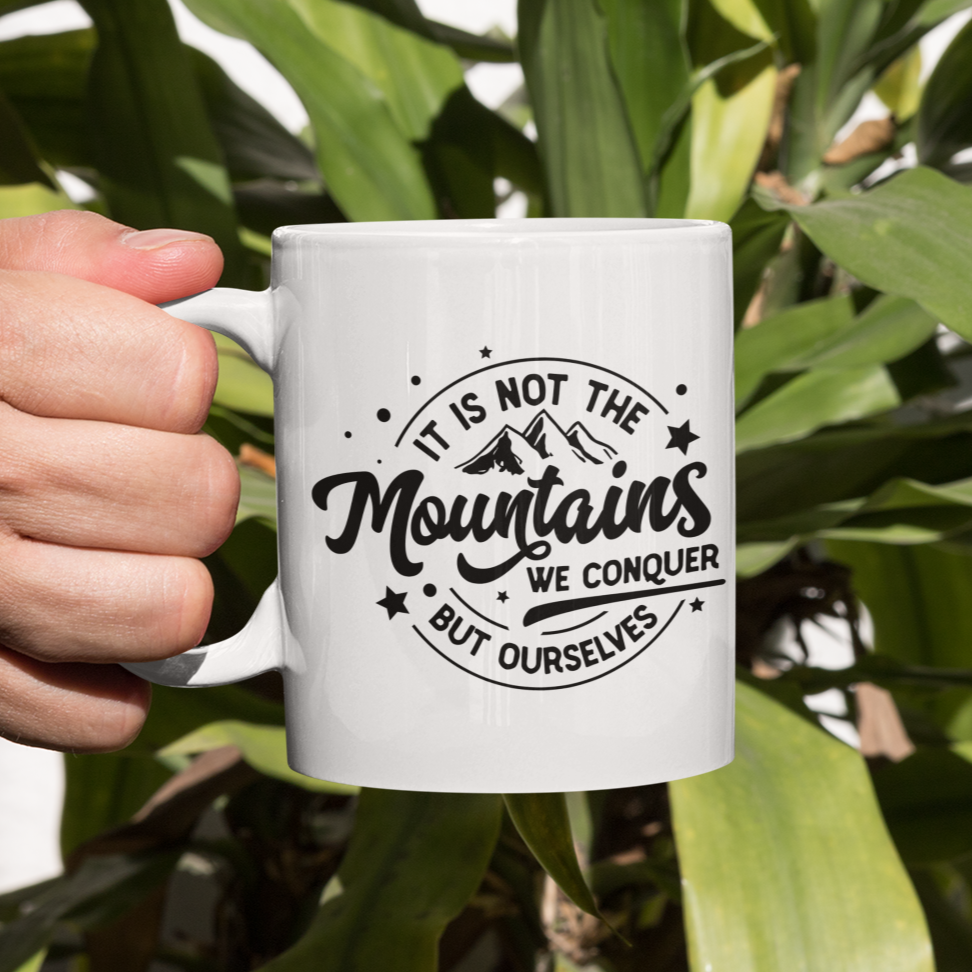 It Is Not The Mountains We Conquer, But Ourselves Mug