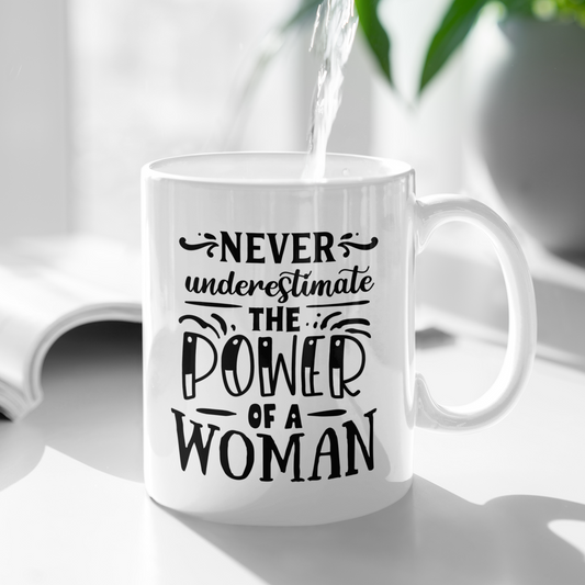 Never Under Estimate The Power Of A Woman Mug